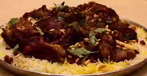 الحنيذ بالأرز والمعكرونة